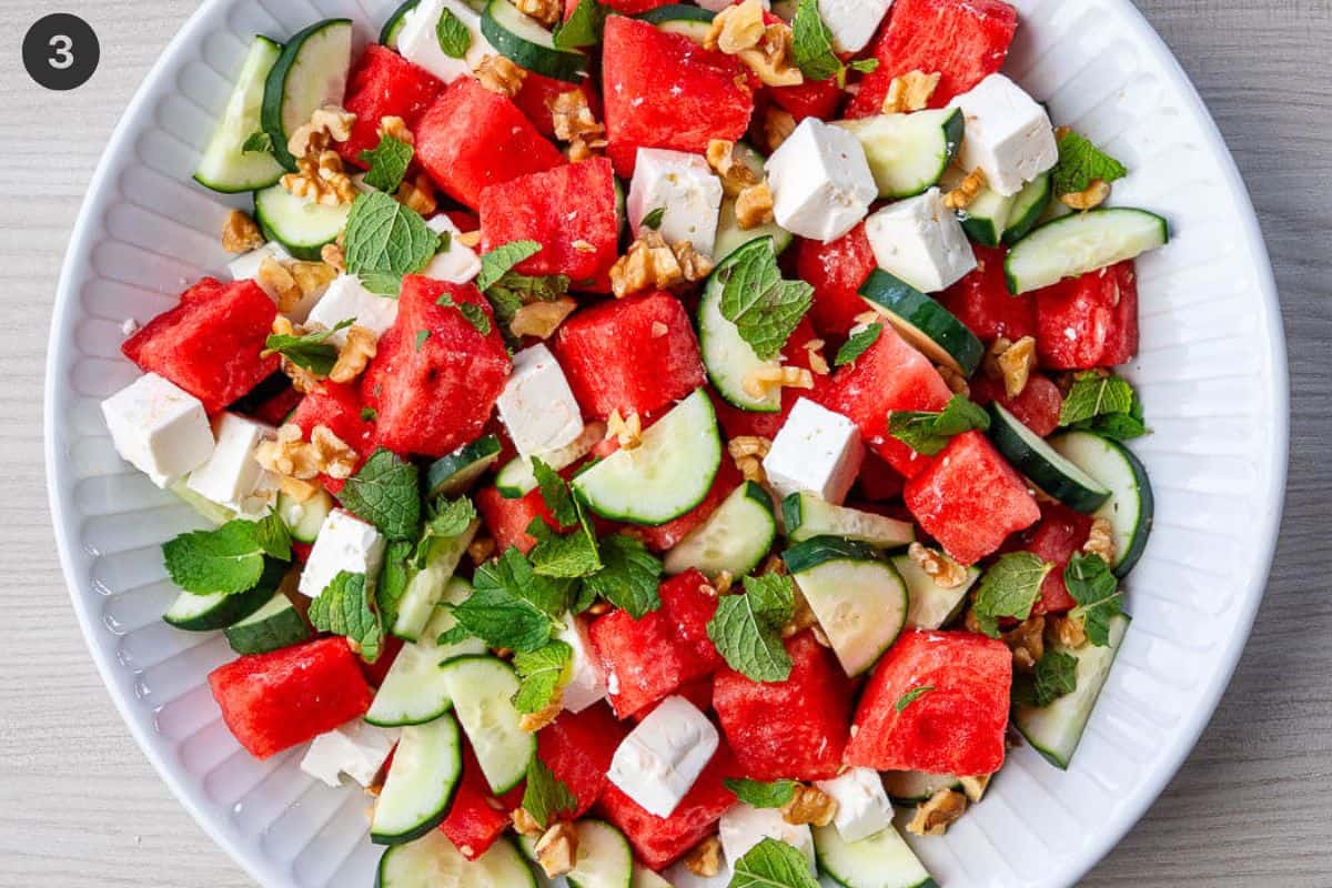 Fresh mint and walnuts added to the salad bowl