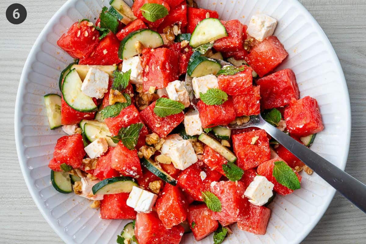 Final step, watermelon feta salad tossed with dressing and now ready to serve