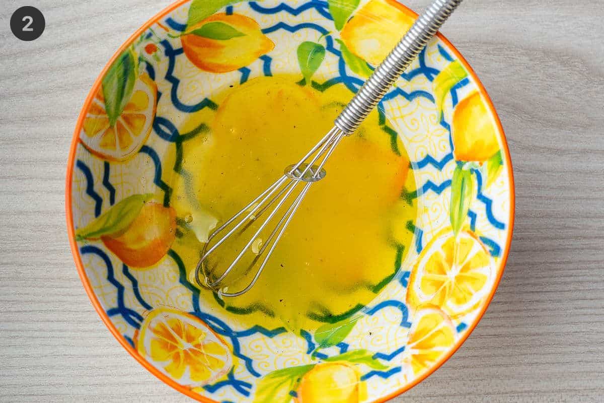 Dressing made in a small bowl with whisk