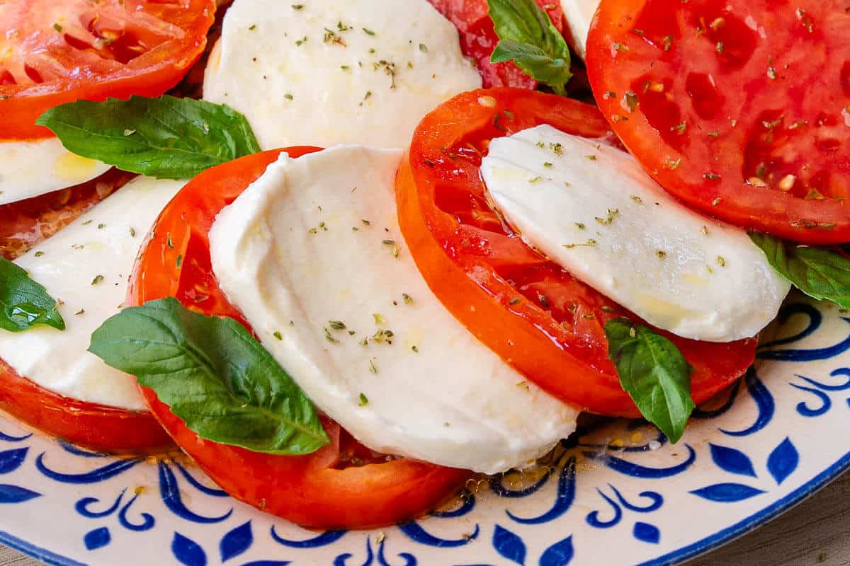 Caprese salad with layers of tomato and mozzarella