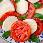 Caprese salad with tomato, mozzarella and fresh basil