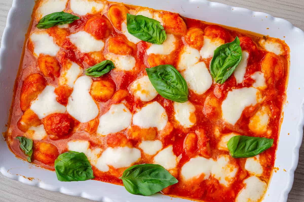 Gnocchi alla Sorrentina straight out of the oven in the tray topped with fresh basil