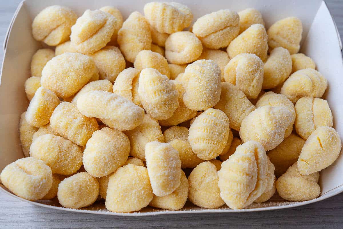 Uncooked gnocchi in semolina flour