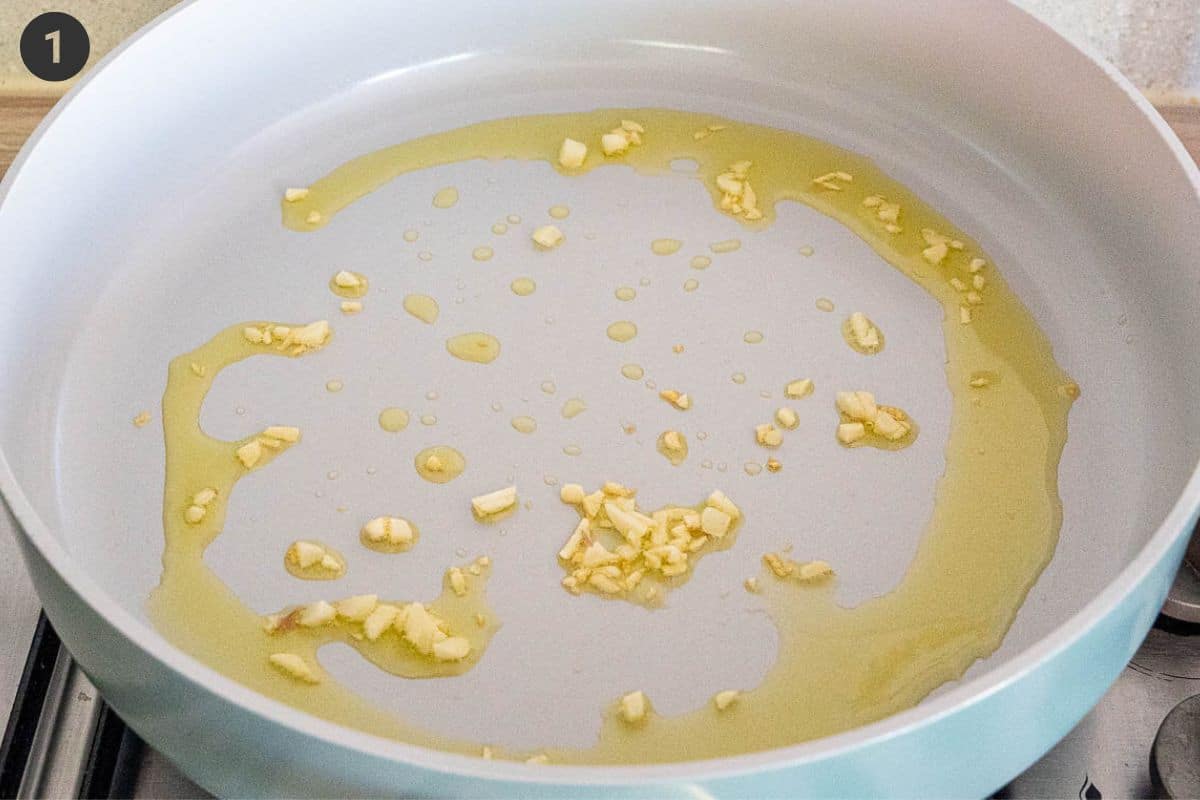 Garlic being sautéed in olive oil