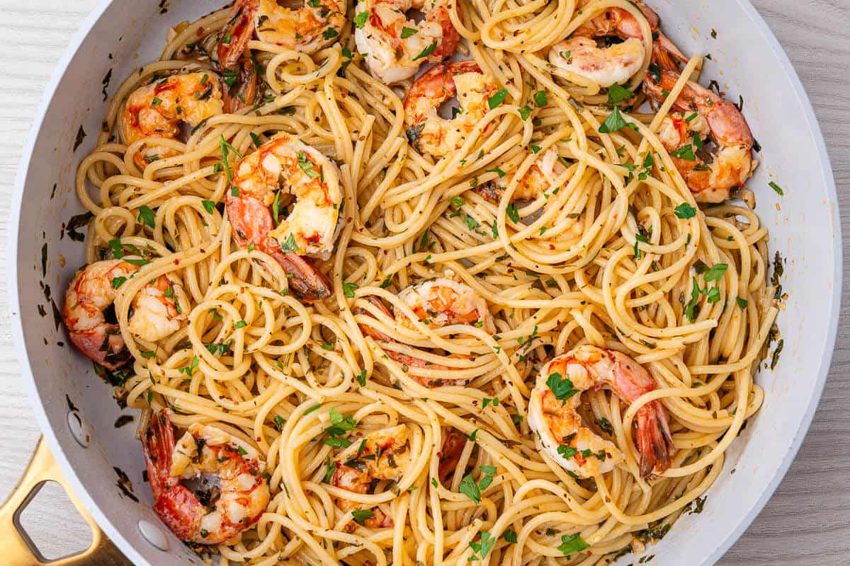 Pan of Shrimp Pasta with spaghetti, fresh parsley and chili flakes