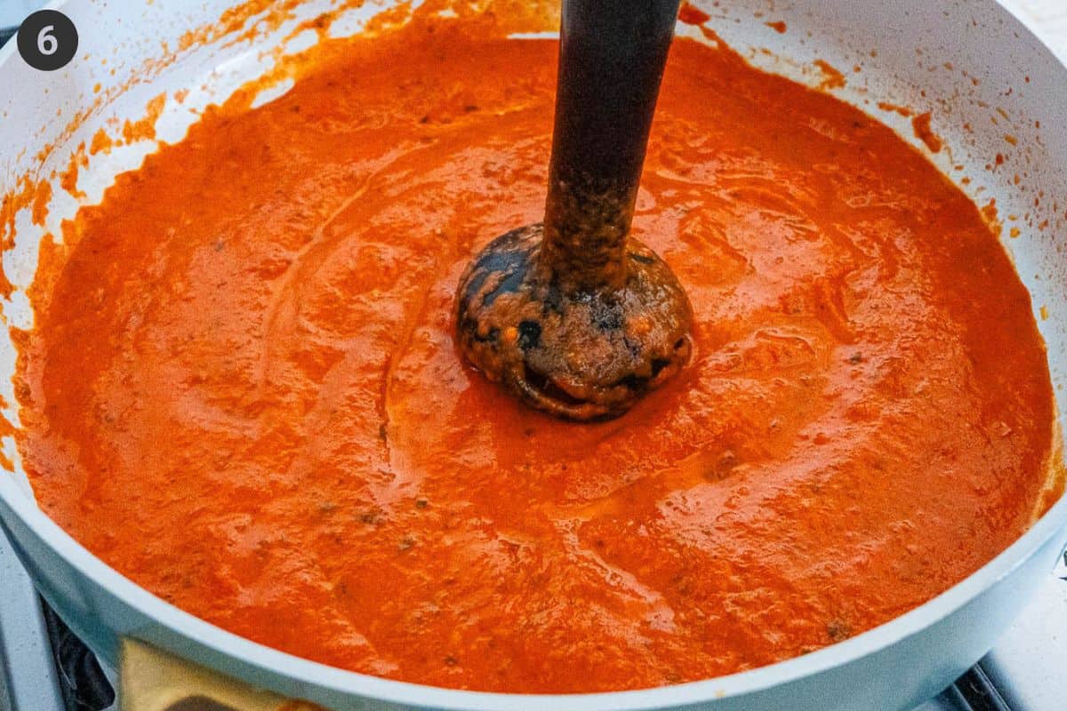 Tomatoes blended in the pan until smooth