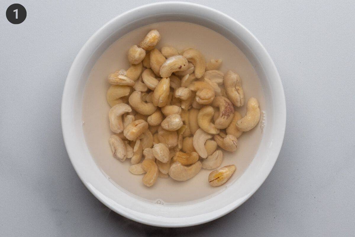 Cashews being soaked in boiling water