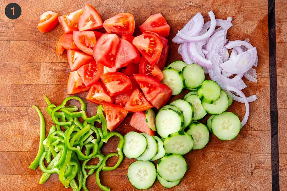 Salad ingredients cut on a chopping board
