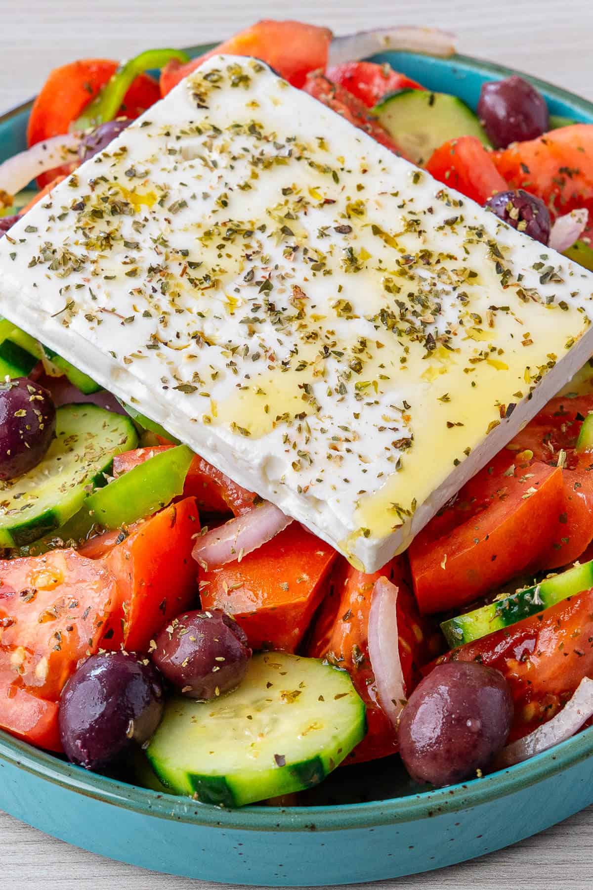 Feta cheese on top of a traditional Greek Salad