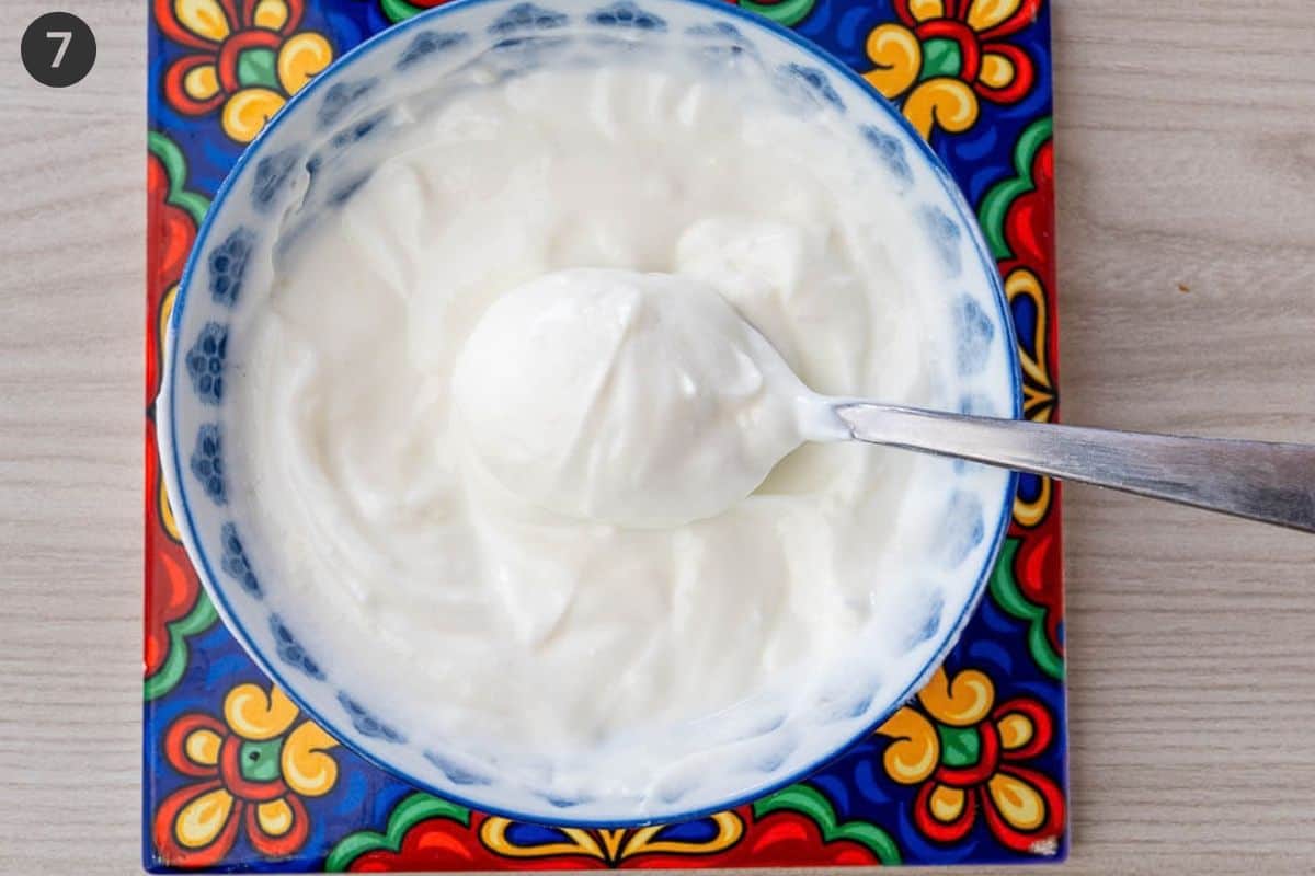 Garlic yogurt sauce prepared in a small bowl